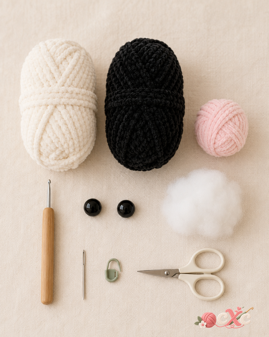 Materials for a panda amigurumi crochet pattern